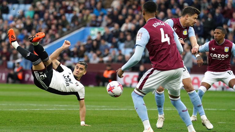 Fulham&#39;s Andreas Pereira (left) attempts a shot on goal