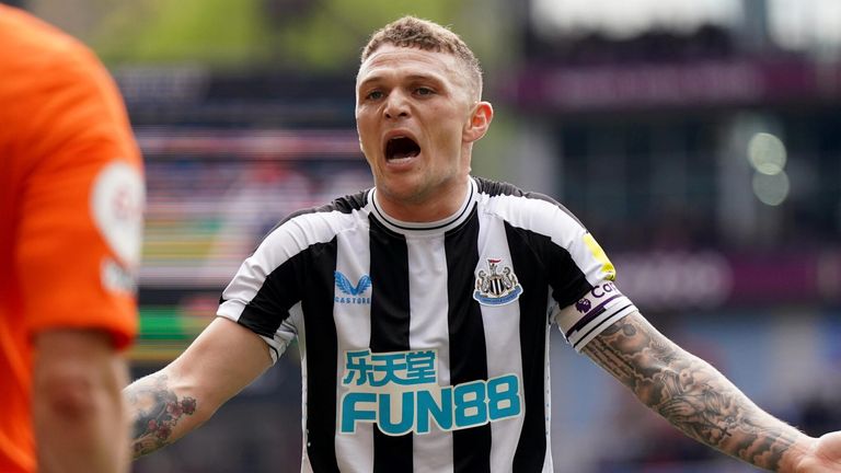 Kieran Trippier argues with the assistant referee at Villa Park