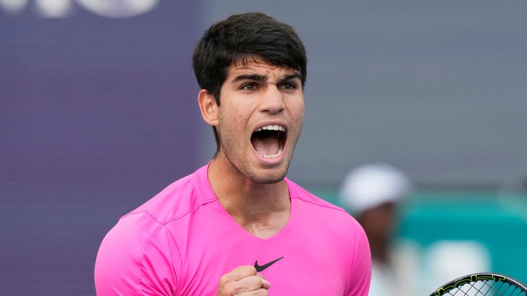 Carlos Alcaraz of Spain reacts after winning the first set against Tommy Paul during the Miami Open tennis tournament, Tuesday, March 28, 2023, in Miami Gardens, Fla. (AP Photo/Marta Lavandier)