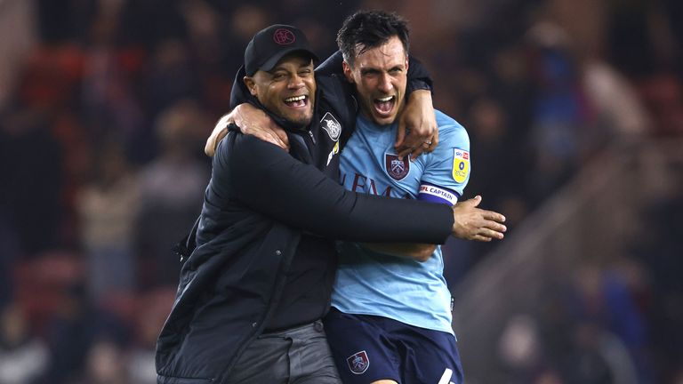 Vincent Kompany celebrates with Jack Cork