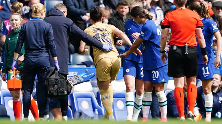 Lucy Bronze is helped off the pitch after picking up an injury