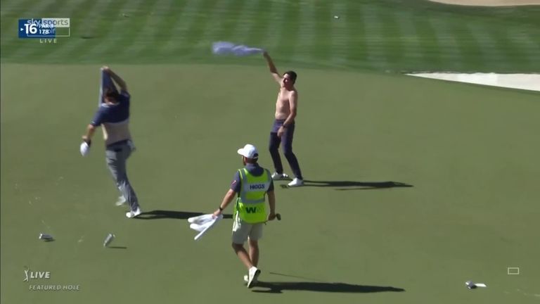 Harry Higgs and Joel Dahmen led the crowd in celebration after Higgs sank an eight-footer for par on the 16th at TPC Scottsdale