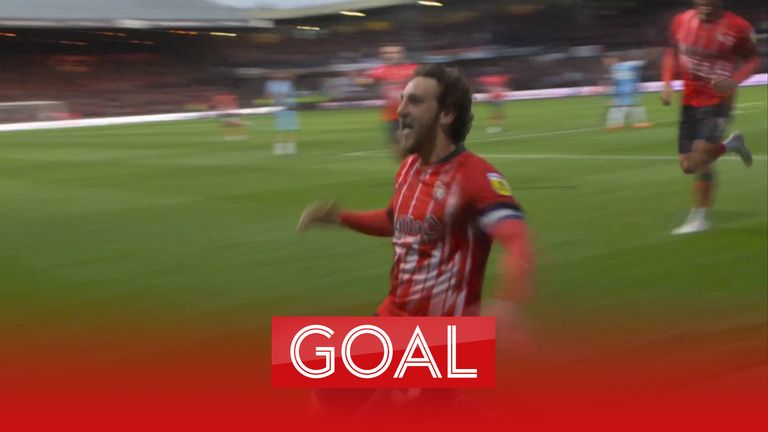 Tom Lockyer celebrates after putting Luton 2-0 up in the second leg of the Championship play-off semi-final against Sunderland.