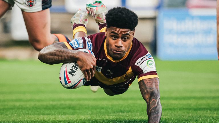 Kevin Naiqama dives over for a try in Huddersfield's win over Castleford