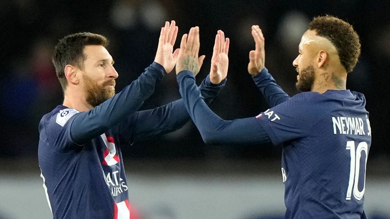 Messi celebrates with Neymar after scoring