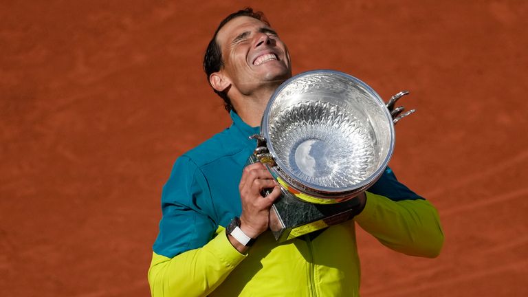 Spain&#39;s Rafael Nadal lifts the trophy after winning the final match against Norway&#39;s Casper Ruud in three sets, 6-3, 6-3, 6-0, at the French Open tennis tournament in Roland Garros stadium in Paris, France, Sunday, June 5, 2022. (AP Photo/Christophe Ena)