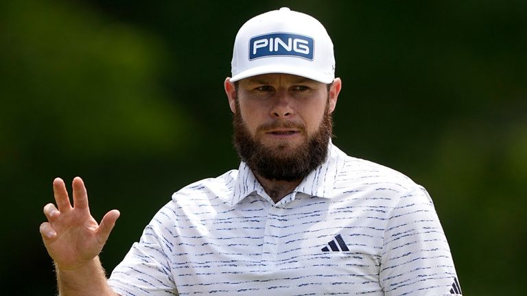 Tyrrell Hatton, of England, waves after his birdie putt on the ninth hole during second round of the Wells Fargo Championship