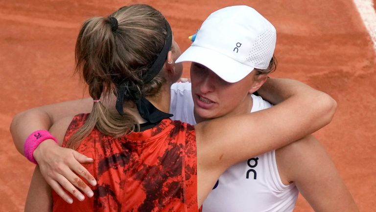 Poland&#39;s Iga Swiatek, right, hugs Karolina Muchova of the Czech Republic after winning the women&#39;s final match of the French Open tennis tournament against Karolina Muchova of the Czech Republic in three sets, 6-2, 5-7, 6-4, at the Roland Garros stadium in Paris, Saturday, June 10, 2023. (AP Photo/Christophe Ena)