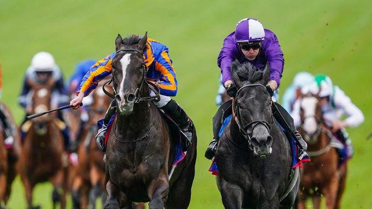 King Of Steel (right) chases home Derby winner Auguste Rodin 