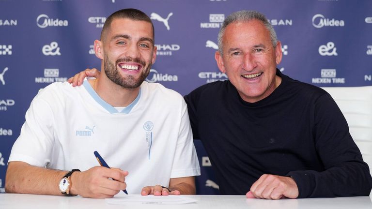 Manchester City unveil their new signing Mateo Kovacic alongside  Txiki Begiristain