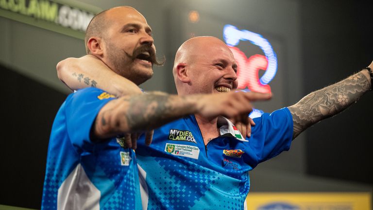 Massimo Dante (left) and Michele Turetta celebrate their win over Switzerland