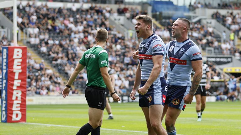 St Helens' Jack Welsby celebrates after scoring the winning try against Salford Red Devils