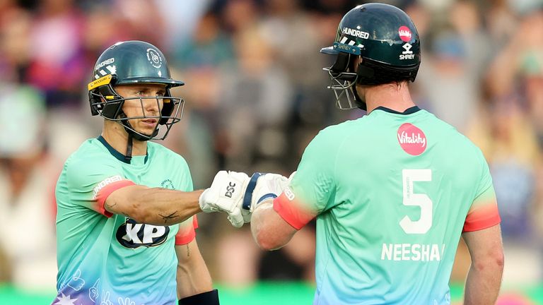 Tim Curran and Jimmy Neesham (Getty Images)