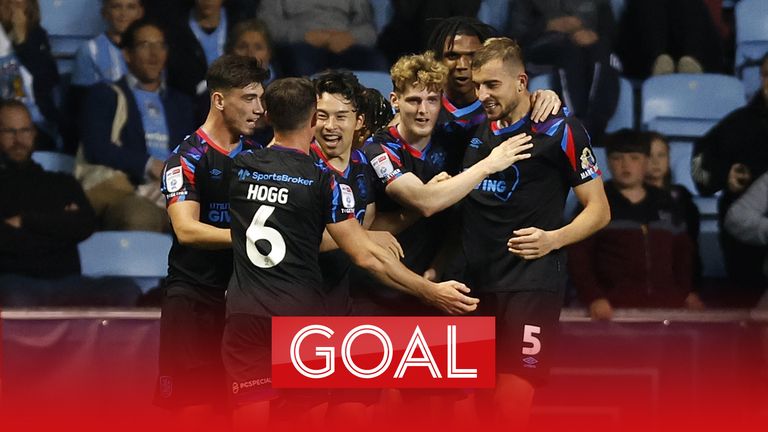 Huddersfield Town&#39;s Michal Helik (right) celebrates with team-mates