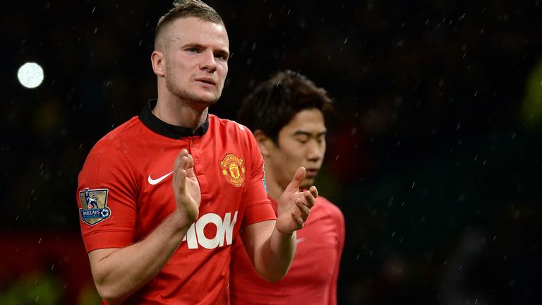 Manchester United&#39;s Tom Cleverley and Shinji Kagawa leave the pitch after their teams 2-1 defeat against Swansea City