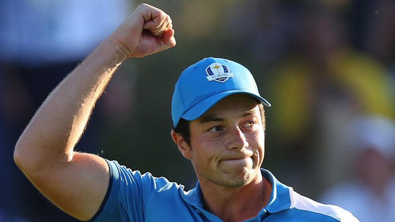 Viktor Hovland secured a dramatic half-point for Team Europe in the top match