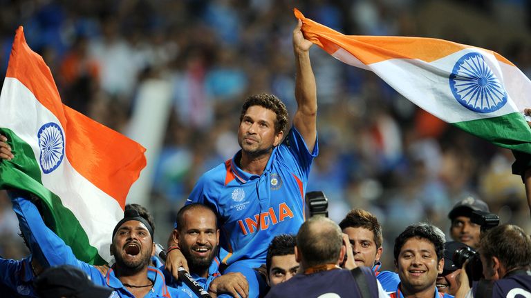 (FILES) In this photograph taken  on April 2, 2011, Indian batsman Sachin Tendulkar is carried on his teammates' shoulders after India defeated Sri Lanka i