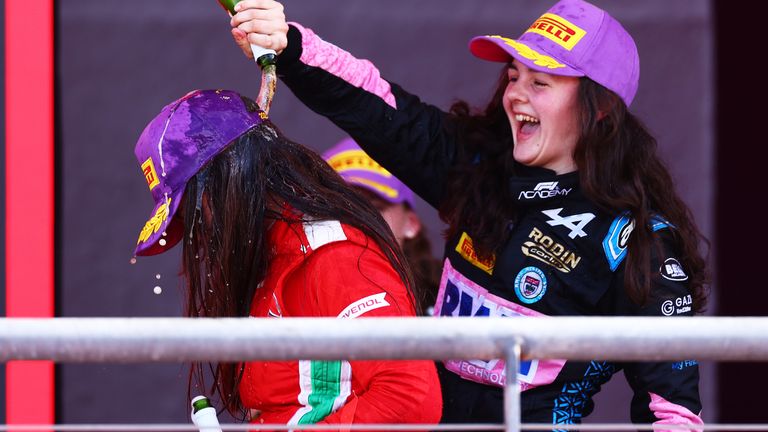 Abbi Pulling celebrates her second-place finish in Race One at the US GP with winner and series champion Marta Garc&#237;a