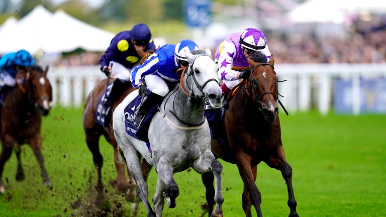 Art Power (left) gets up to beat Kinross in the Champions Sprint at Ascot