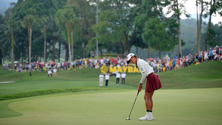 Celine Boutier putts on the green during the first play off at the 18th hole during the final round of the LPGA Maybank Championship in Kuala Lumpur, Malaysia