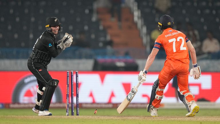 New Zealand&#39;s wicketkeeper Tom Latham dislodges the bails to stump out Netherlands&#39; Sybrand Engelbrecht, which was deemed not out by the third umpire