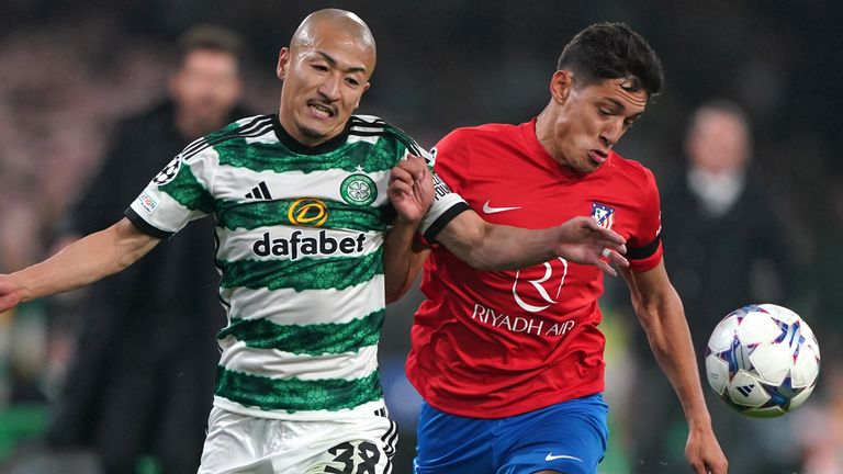 Celtic&#39;s Daizen Maeda (left) and Atletico Madrid&#39;s Nahuek Molina battle for the ball