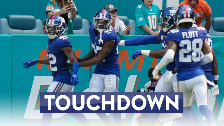 New York Giants safety Jason Pinnock goes the length of the field for a 102-yard pick-six as linebacker Bobby Okereke tips the Tua Tagovailoa pass into the waiting hands of Pinnock