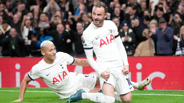 Tottenham&#39;s James Maddison and team-mate Richarlison delebrate their second goal against Fulham (AP Photo/Kin Cheung)