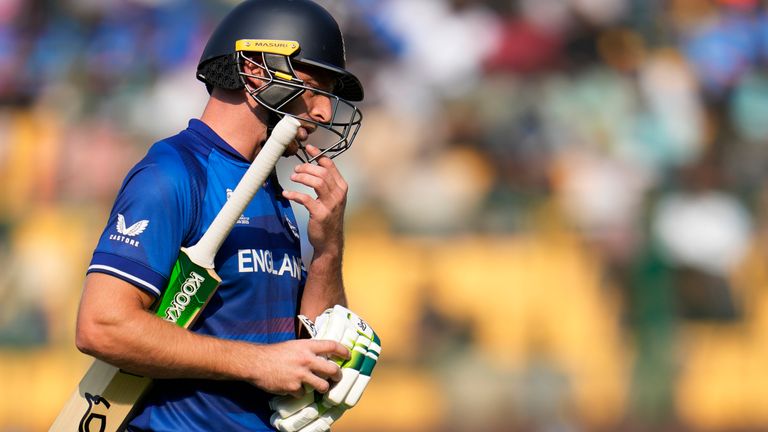 England&#39;s captain Jos Buttler leaves the ground after losing his wicketduring the ICC Men&#39;s Cricket World Cup match between England and Sri Lanka in Bengaluru, India, Thursday, Oct. 26, 2023. (AP Photo/Aijaz Rahi)