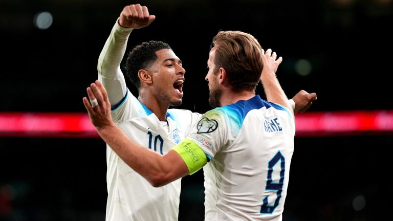 Jude Bellingham embraces England goalscorer Harry Kane