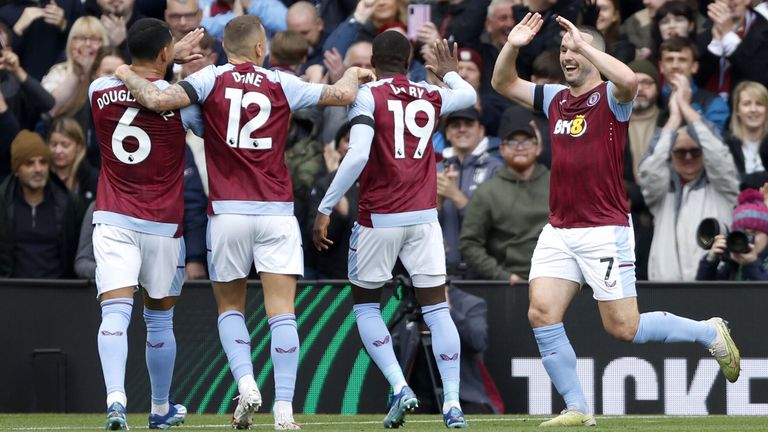 John McGinn celebrates after opening the scoring for Aston Villa against Luton Town 