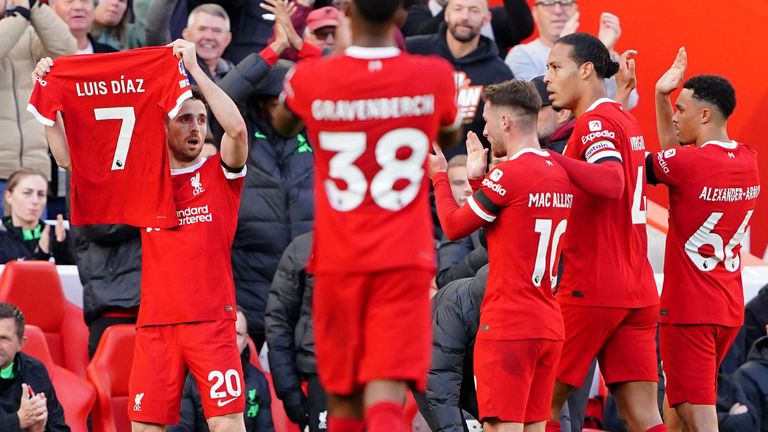 Diogo Jota raises Luis Diaz&#39;s jersey as he celebrates scoring Liverpool&#39;s opening goal against Nottingham Forest