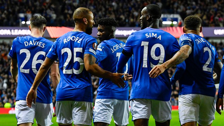 GLASGOW, SCOTLAND - SEPTEMBER 21: Rangers&#39; Abdallah Sima celebrates with Ben Davies as he scores to make it 1-0 during the UEFA Europa League Group Stage match between Rangers and Real Betis at Ibrox Park, on September 21, 2023, in Glasgow, Scotland. (Photo by Rob Casey / SNS Group)