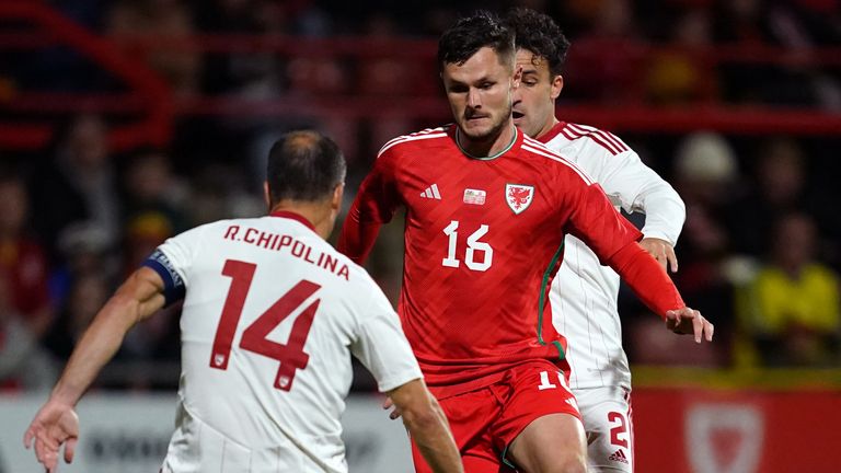 Wales&#39; Liam Cullen runs at Gibraltar&#39;s Roy Chipolina