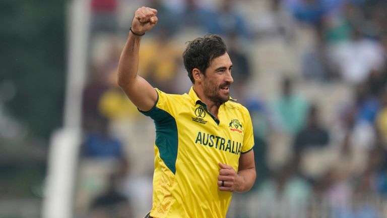 Australia&#39;s Mitchell Starc celebrates the wicket of South Africa&#39;s captain Temba Bavuma during the ICC Men&#39;s Cricket World Cup second semifinal match between Australia and South Africa in Kolkata, India, Thursday, Nov.16, 2023. (AP Photo/Aijaz Rahi)