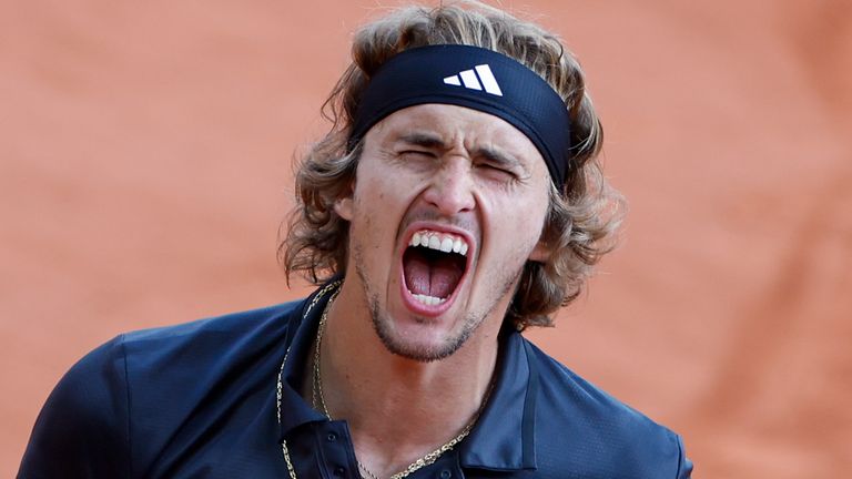 Alexander Zverev celebrates winning his quarterfinal match at the French Open