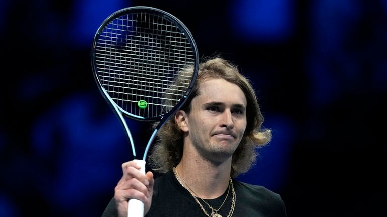 Germany&#39;s Alexander Zverev rcelebrates after winning the singles tennis match against Spain&#39;s Carlos Alcaraz, of the ATP World Tour Finals at the Pala Alpitour, in Turin, Italy, Monday, Nov. 13, 2023. (AP Photo/Antonio Calanni)