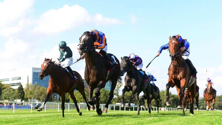 Auguste Rodin and Ryan Moore win the Royal Bahrain Irish Champion Stakes