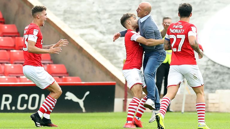 Barnsley&#39;s Patrick Schmidt (second left) celebrates scoring his sides first goal of the game with Barnsley manager Gerhard Struber during the Sky Bet Championship match at Oakwell, Barnsley. PA Photo. Issue date: Sunday July 19, 2020. See PA story SOCCER Barnsley.      