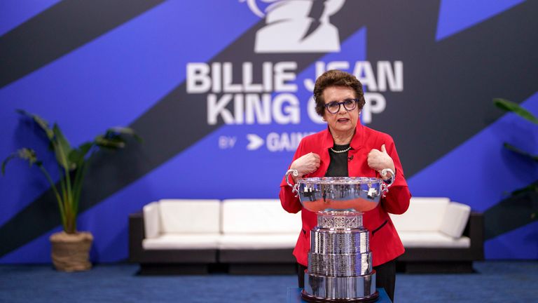 US tennis star Billie Jean King gestures next to the Billie Jean King trophy during the second day of the Billie Jean King Cup finals at La Cartuja stadium in Seville, southern Spain, Wednesday, Nov. 8, 2023. (AP Photo/Manu Fernandez)