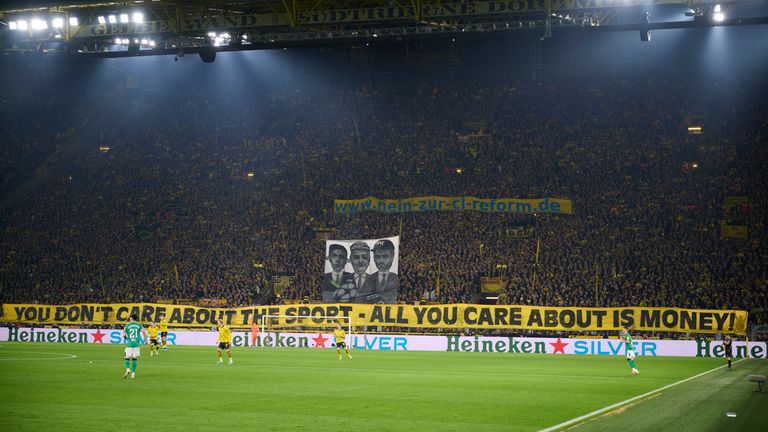 07 November 2023, North Rhine-Westphalia, Dortmund: Soccer: Champions League, Borussia Dortmund - Newcastle United, Group stage, Group F, Matchday 4, Signal Iduna Park. Dortmund fans protest the Champions League reforms.