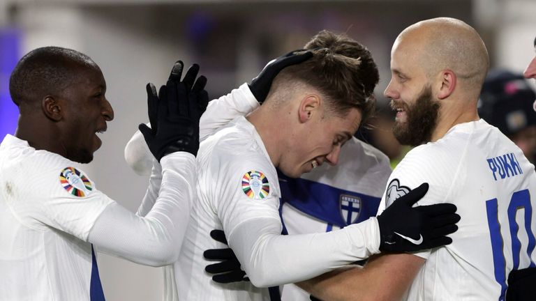 Finland&#39;s Teemu Pukki, second from right, celebrates with teammates after scoring their side&#39;s third goal of the game during the Euro 2024 group H qualifying soccer match between Finland and Northern Ireland at the Olympic Stadium in Helsinki, Finland, Friday, Nov. 17, 2023. (Roni Rekomaa/Lehtikuva via AP)