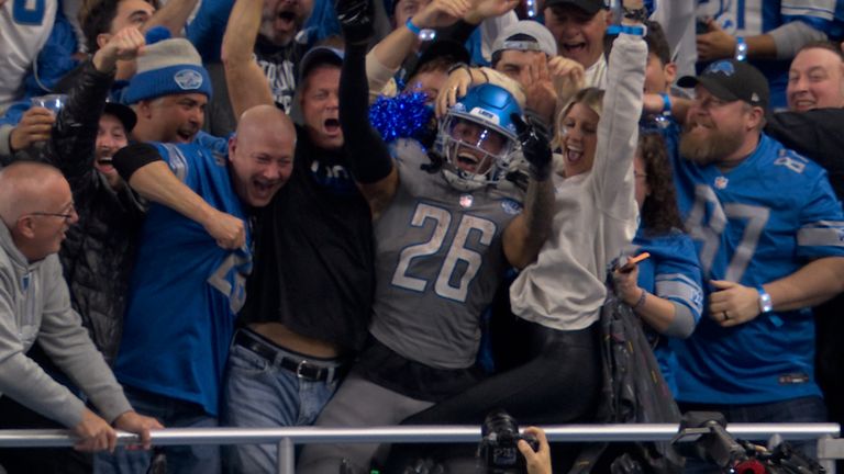 Detroit Lions running back Jahmyr Gibbs lept high into the stands to join the crowd after scoring on a 27-yard touchdown run against the Las Vegas Raiders