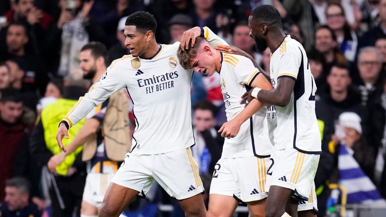 Real Madrid&#39;s Nico Paz celebrates with Bellingham