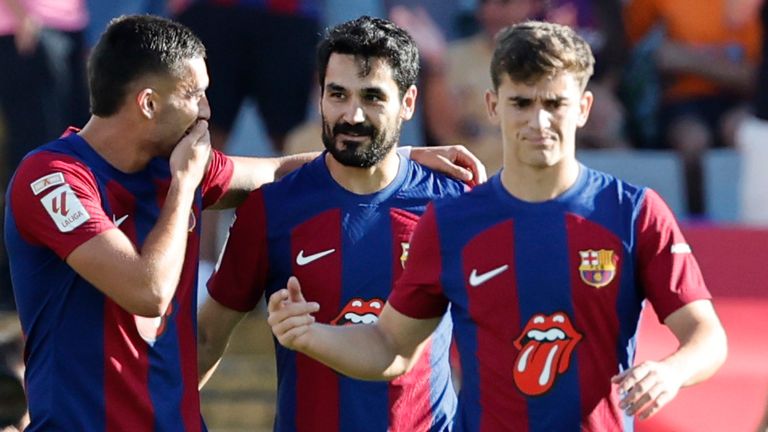 Ilkay Gundogan is congratulated after giving Barcelona the lead against Real Madrid