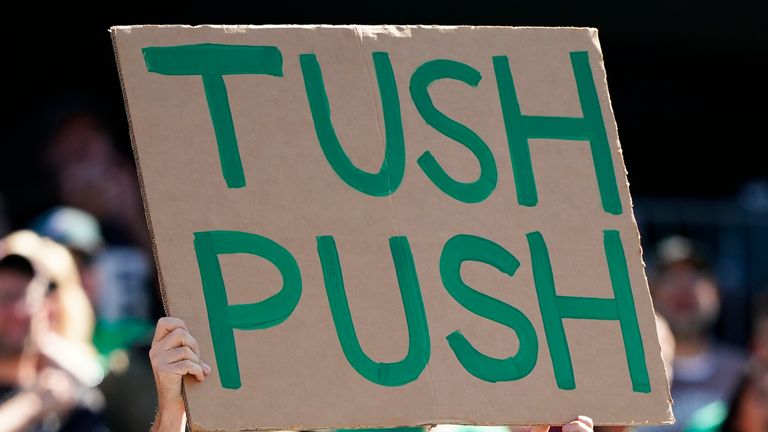 A Philadelphia Eagles fan holds up a sign for a play during the first half of an NFL football game between the Eagles and the Washington Commanders on Sunday, Oct. 1, 2023, in Philadelphia. (AP Photo/Chris Szagola)