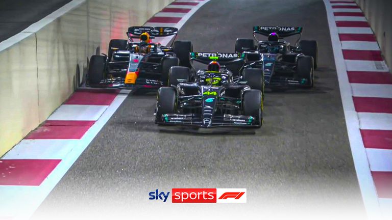 Max Verstappen squeezes past cars in the pit lane after the drivers were given the green light to continue the second practice session at the Abu Dhabi GP