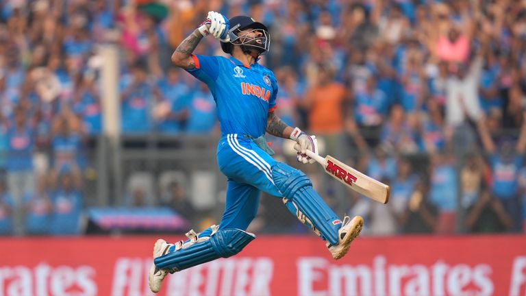 India&#39;s Virat Kohli celebrates his century during the ICC Men&#39;s Cricket World Cup first semifinal match between India and New Zealand in Mumbai, India, Wednesday, Nov. 15, 2023. (AP Photo/Rafiq Maqbool)