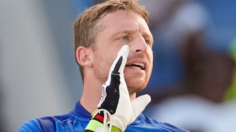 England&#39;s captain Jos Buttler..talks to teammates during the first ODI cricket match against West I dies at Sir Vivian Richards Stadium in North Sound, Antigua and Barbuda, Sunday, Dec. 3, 2023. (AP Photo/Ricardo Mazalan)