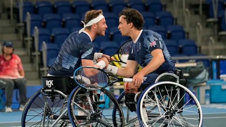 Alfie Hewett (left) and Gordon Reid celebrate a point during their Wheelchair tennis men&#39;s doubles final